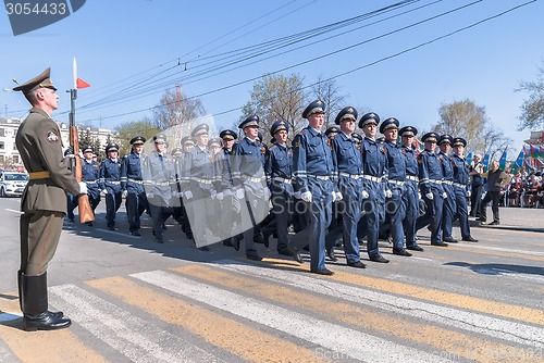 Image of Company of traffic police officers march on parade