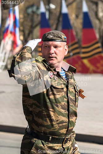 Image of Army captain salutes on Victory Day parade