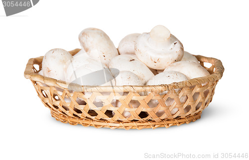 Image of Mushrooms Champignon In A Wicker Basket