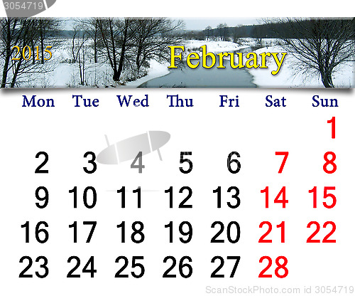 Image of calendar for February of 2015 with winter river
