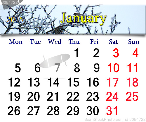 Image of calendar for January of 2015 with winter sparrows