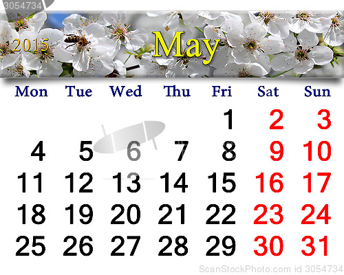 Image of calendar for May of 2015 year with blooming cherry