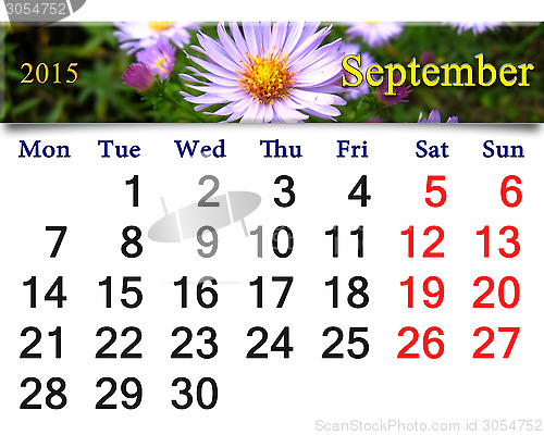 Image of calendar for July of 2015 with flower of aster