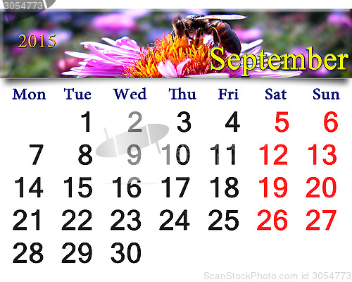 Image of calendar for September of 2015 with bee on flower