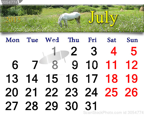 Image of calendar for July of 2015 with horse in field