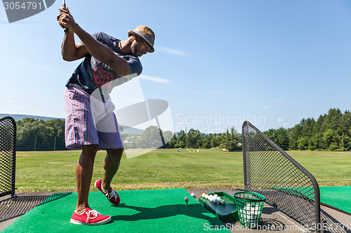 Image of Golfer at the Range
