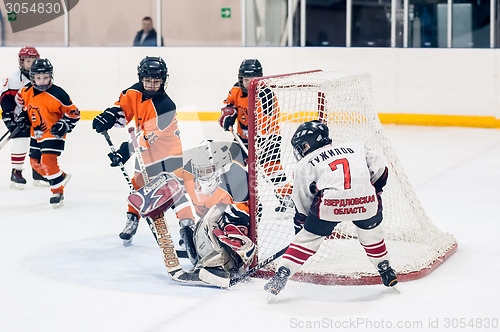 Image of Children hockey. Attack of gate