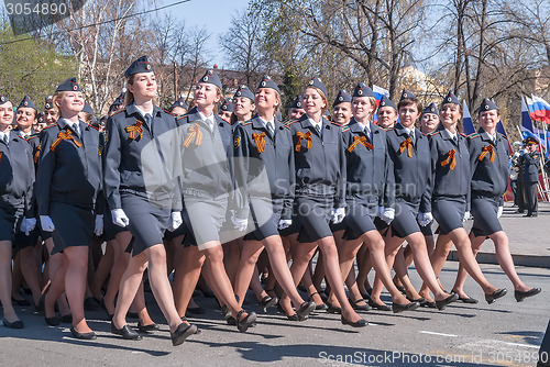 Image of Women-cadets of police academy marching on parade