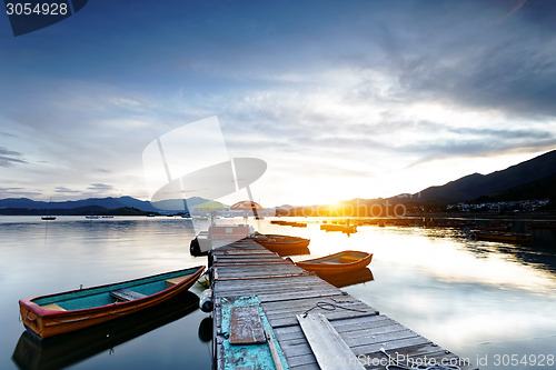 Image of Boat pier at sunset