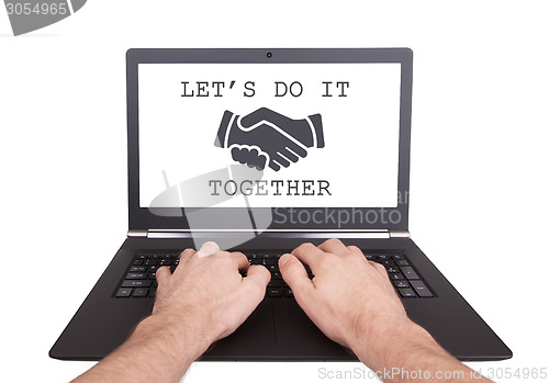 Image of Man working on laptop, let's do it together