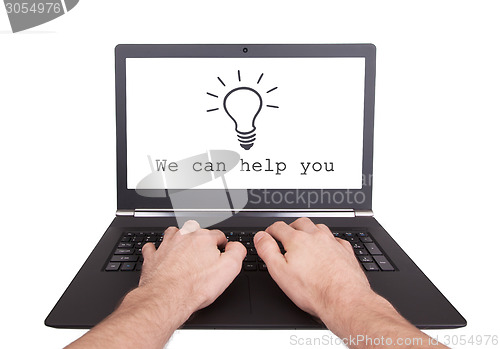 Image of Man working on laptop, we can help you