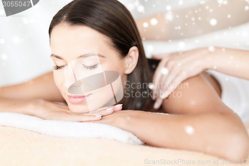 Image of beautiful young woman in spa