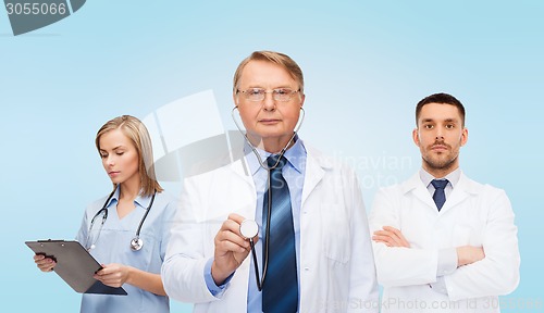 Image of group of doctors with clipboard and stethoscopes
