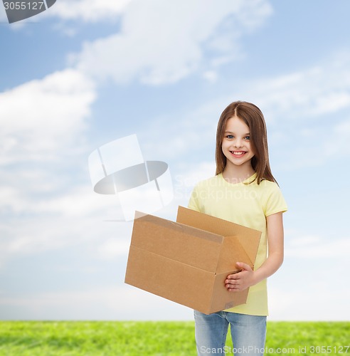 Image of smiling little girl in white blank t-shirt