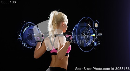 Image of sporty woman exercising with barbell from back