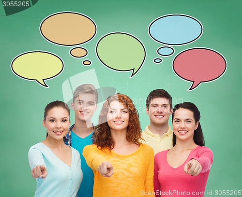 Image of group of smiling teenagers with text bubbles