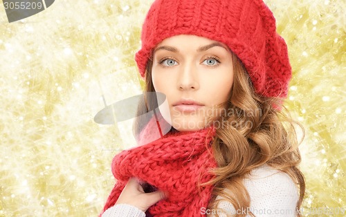 Image of close up of young woman in winter clothes