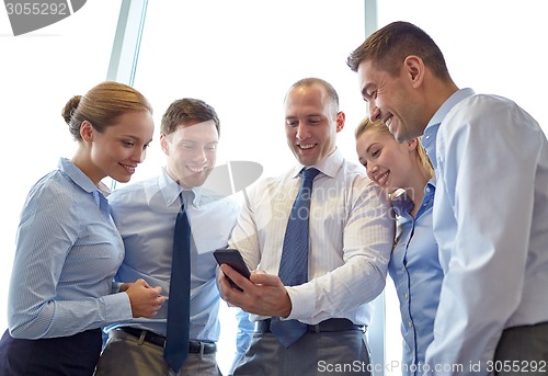 Image of happy businesspeople with smartphone