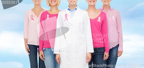 Image of close up of women with cancer awareness ribbons