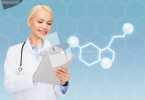 Image of smiling female doctor with tablet pc and molecule