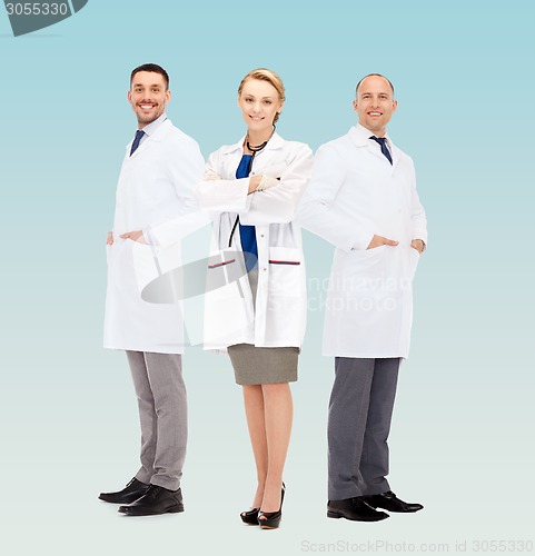 Image of group of smiling doctors in white coats