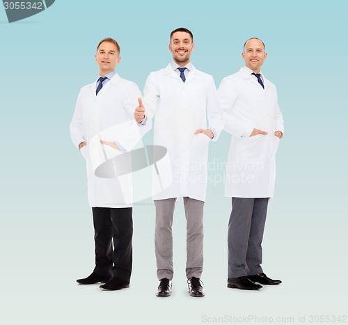 Image of smiling male doctors in white coats