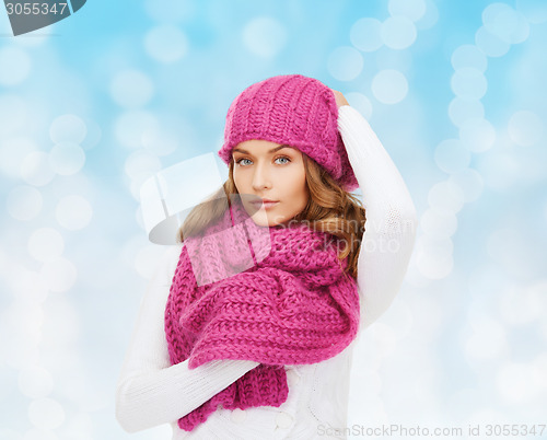 Image of smiling young woman in winter clothes