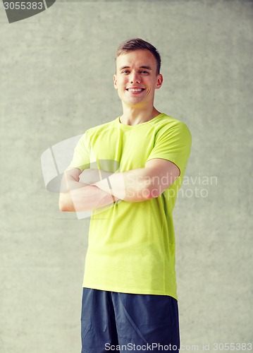 Image of smiling man in gym