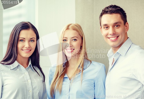 Image of happy business team in office