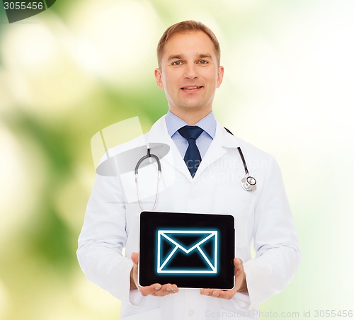 Image of smiling male doctor with stethoscope and tablet pc