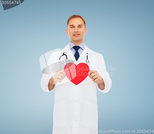 Image of smiling male doctor with red heart and stethoscope