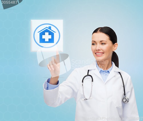 Image of smiling doctor or nurse pointing to pills icon