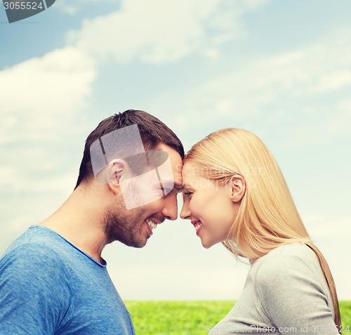 Image of smiling couple looking at each other