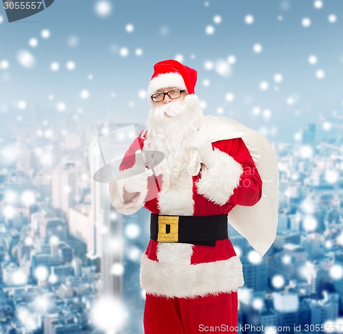 Image of man in costume of santa claus with bag