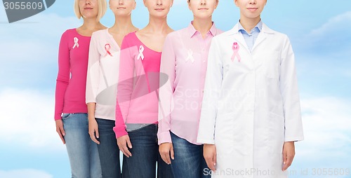 Image of close up of women with cancer awareness ribbons