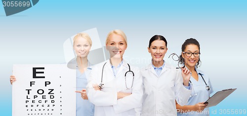 Image of smiling female eye doctors and nurses