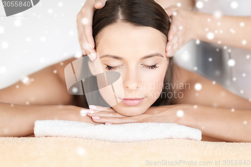 Image of beautiful young woman in spa