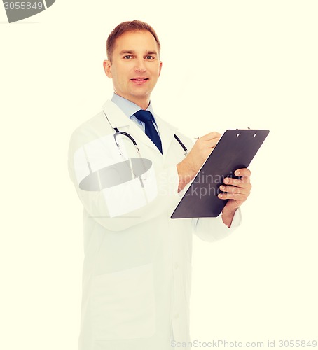 Image of smiling male doctor with clipboard and stethoscope