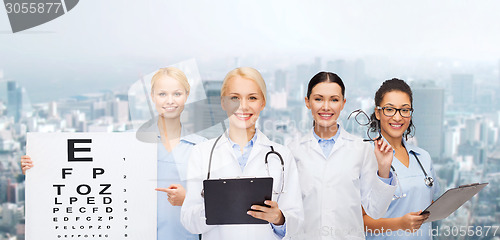 Image of smiling female eye doctors and nurses