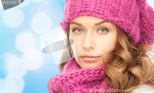 Image of close up of young woman in winter clothes