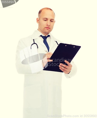 Image of serious male doctor with clipboard and stethoscope