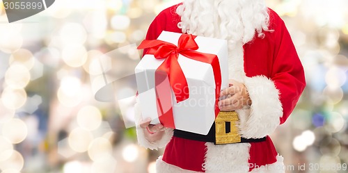 Image of close up of santa claus with gift box
