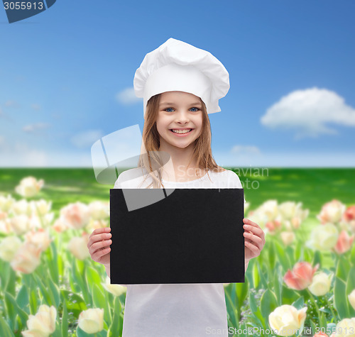 Image of little cook or baker with blank black paper