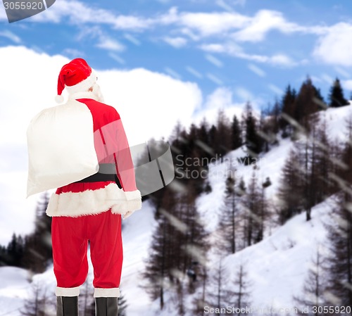 Image of man in costume of santa claus with bag