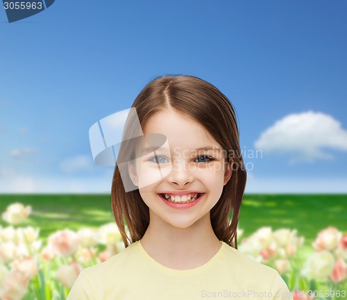 Image of smiling little girl over white background