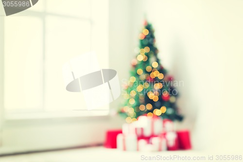 Image of room with christmas tree and presents background