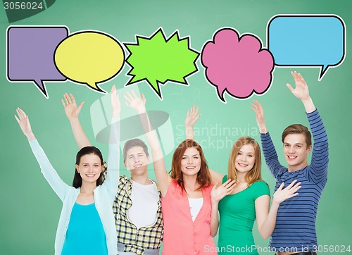 Image of group of smiling teenagers with text bubbles