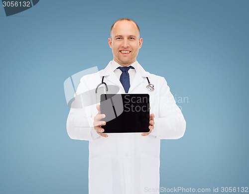 Image of smiling male doctor with stethoscope and tablet pc