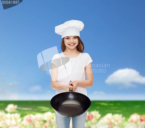 Image of smiling little girl in white blank t-shirt