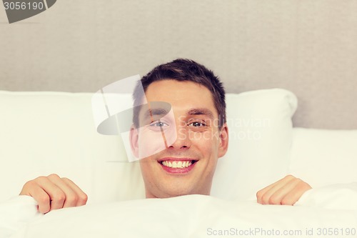 Image of handsome sleeping in bed